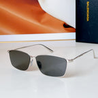 Bvlgari glasses with silver frame and dark gray lenses, rectangular-aviator style