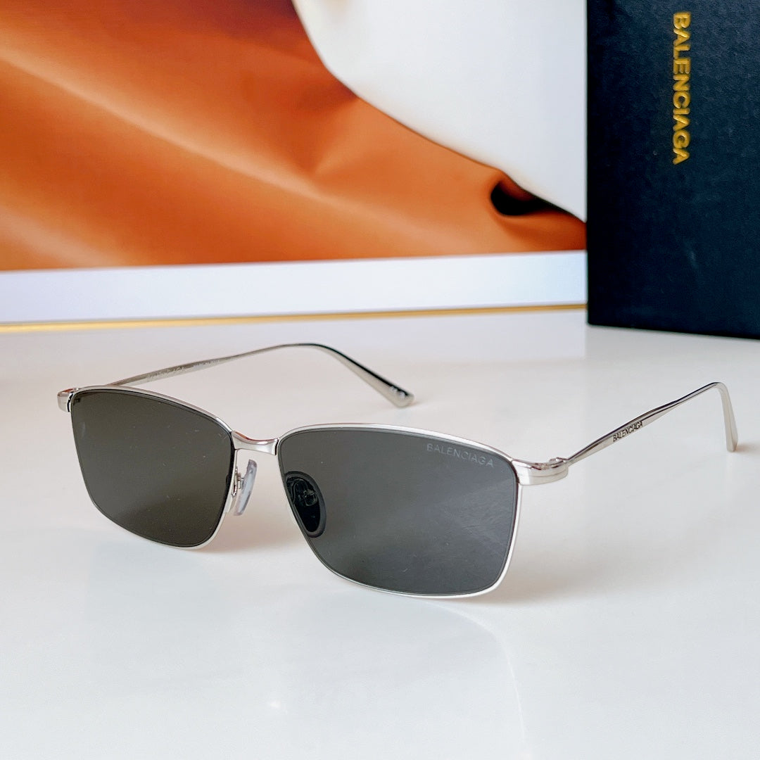 Bvlgari glasses with silver frame and dark gray lenses, rectangular-aviator style