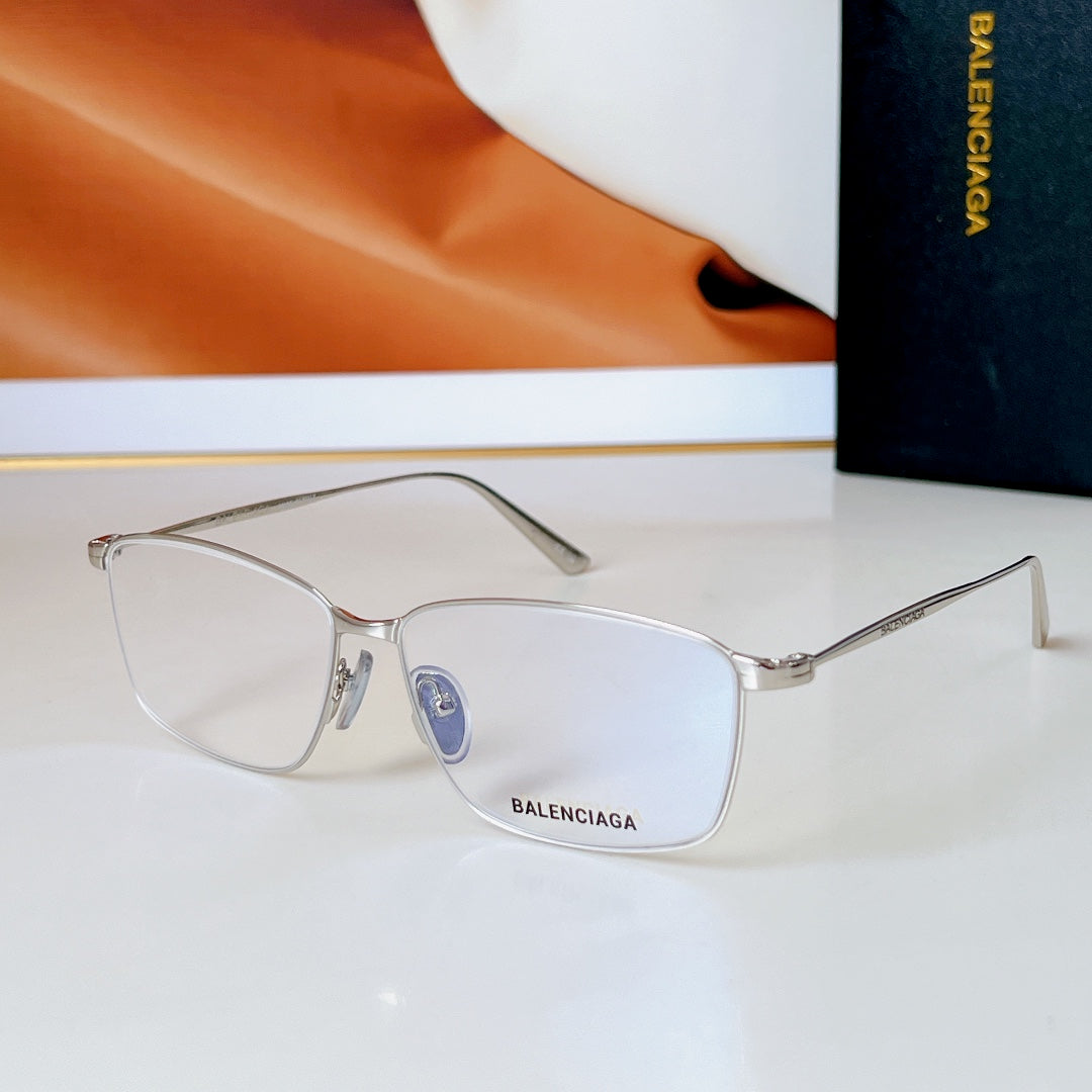 Bvlgari glasses with silver frame and clear lenses, BALENCIAGA detail on temple