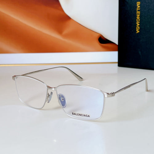 Bvlgari glasses with silver frame and clear lenses, BALENCIAGA detail on temple