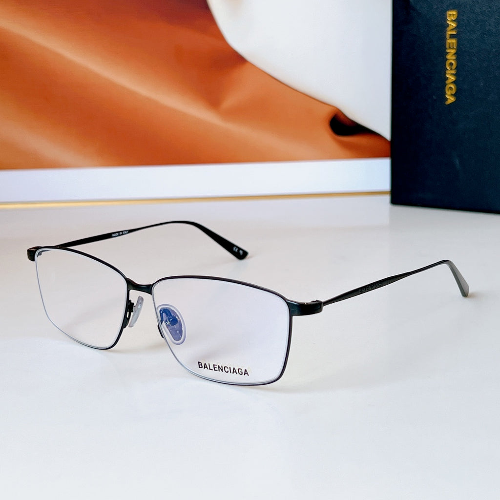 Bvlgari glasses with black frame and clear lenses, BALENCIAGA detail on lens