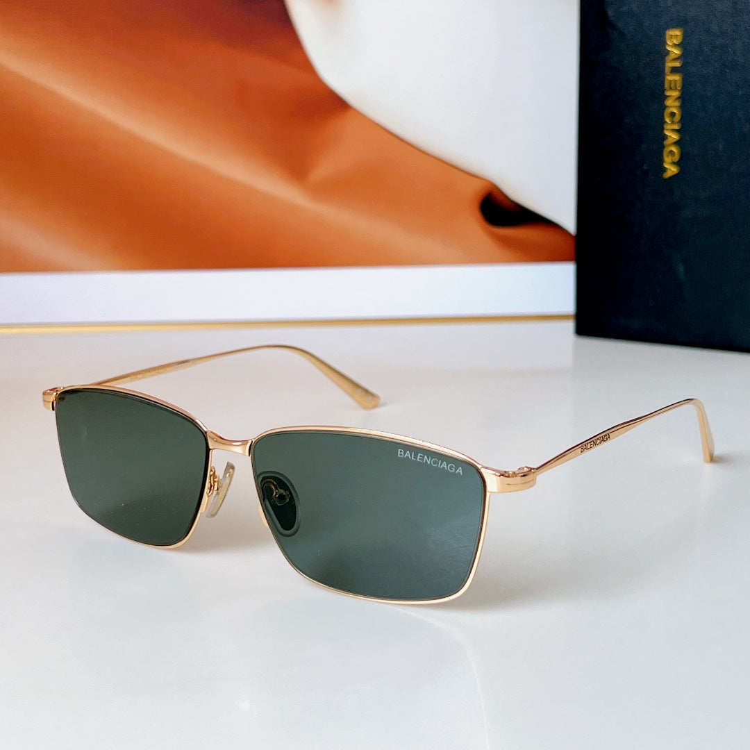 Bvlgari glasses with gold frame and green-tinted lenses, rectangular-aviator style
