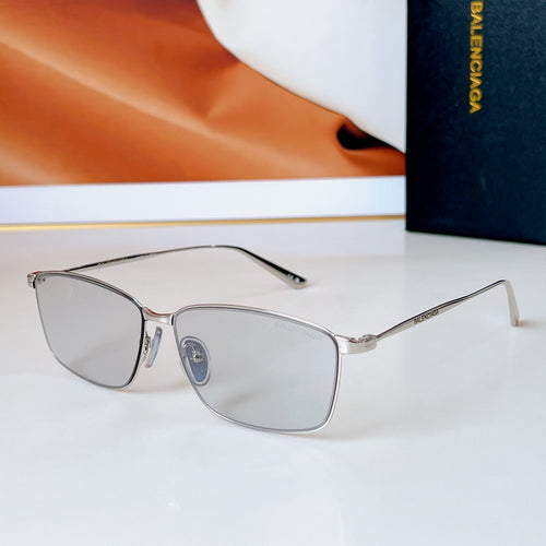 Bvlgari glasses with silver frame and clear lenses, rectangular-aviator style