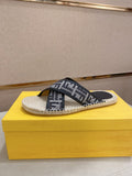 Fendi slide sandals with black and white monogram straps and espadrille rope sole