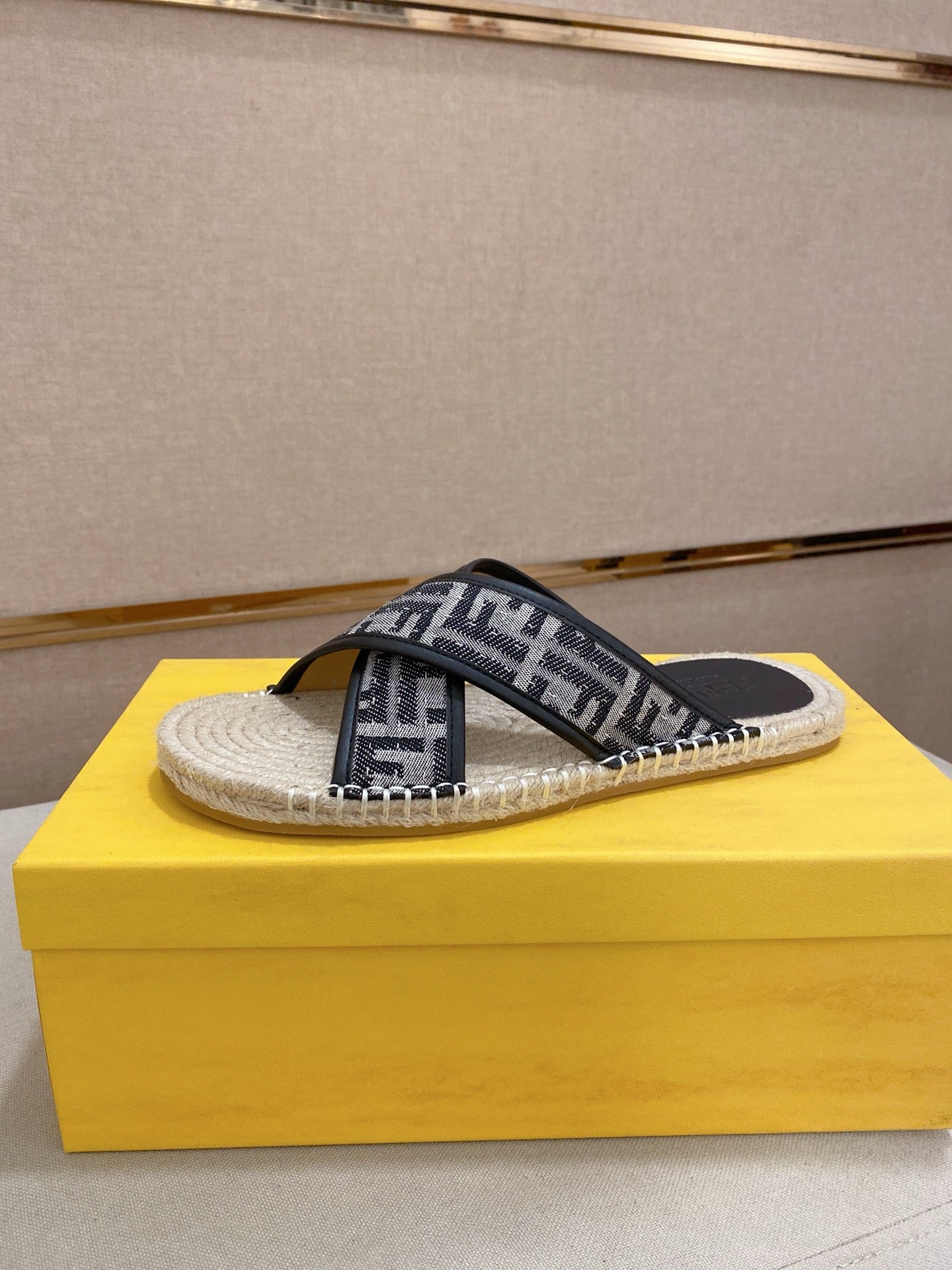 Fendi slide sandals with black and white monogram straps and espadrille rope sole