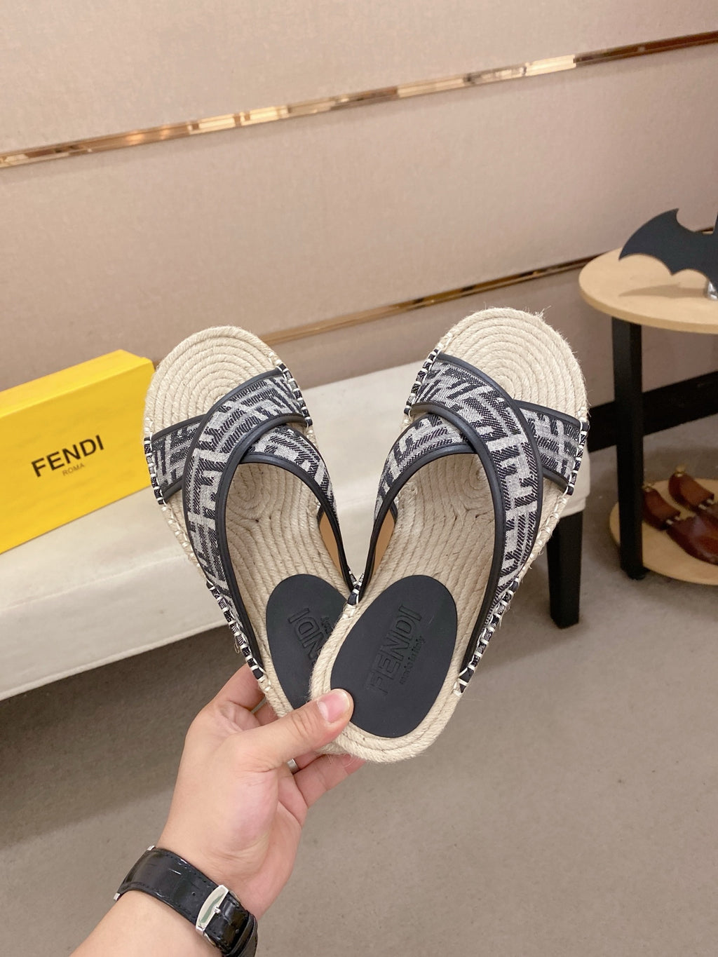 Fendi monogram sandals pair view, black straps with cream woven soles