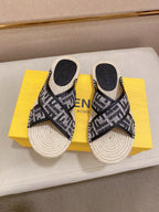 Fendi pair of monogram slide sandals on box, black straps and cream espadrille soles