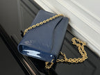 Louis Vuitton crossbody bag navy blue with gold chain strap and flap closure