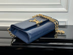 Louis Vuitton bag navy blue with gold front hardware and textured finish