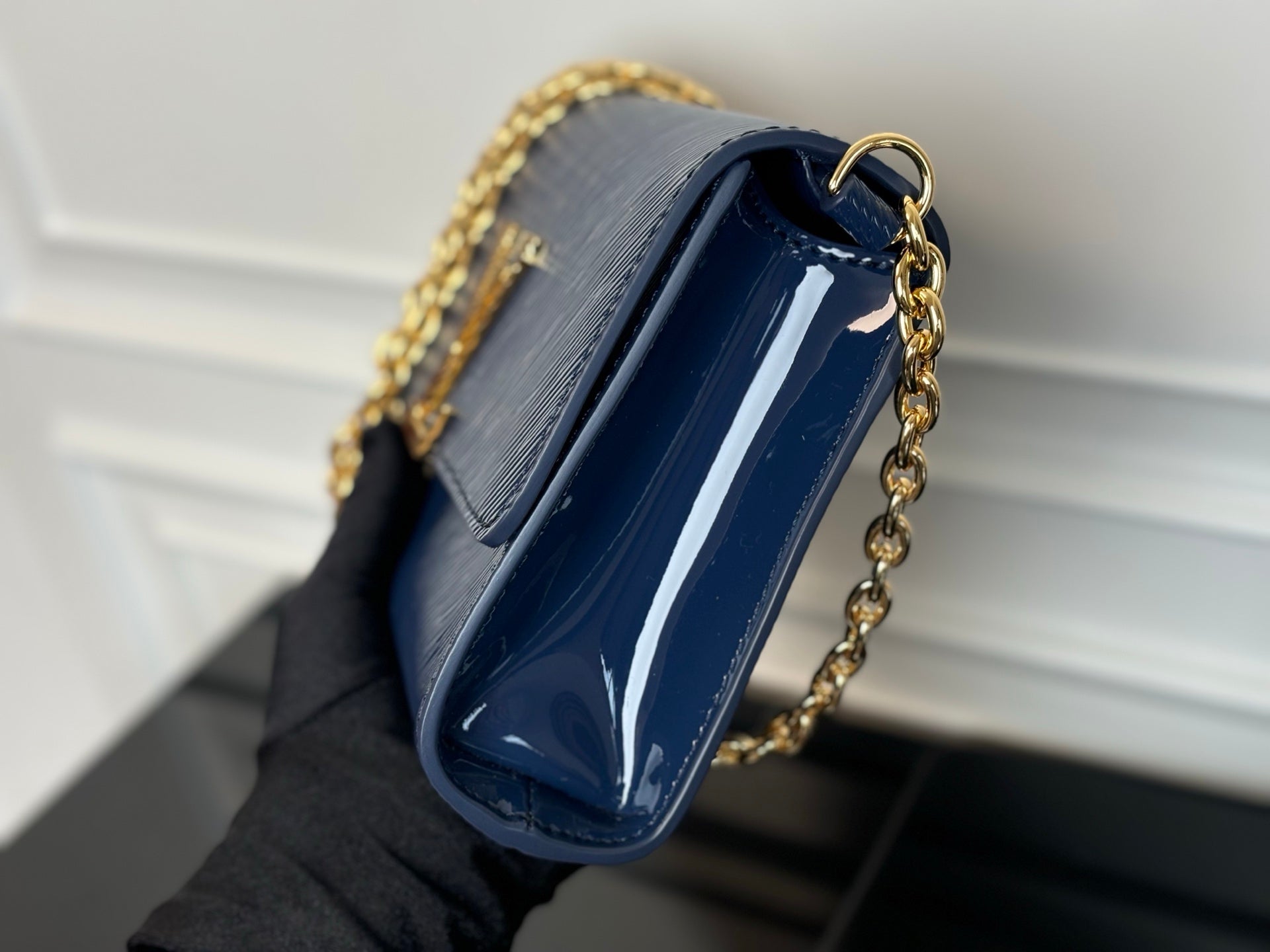 Louis Vuitton crossbody bag navy blue with glossy interior and gold chain strap