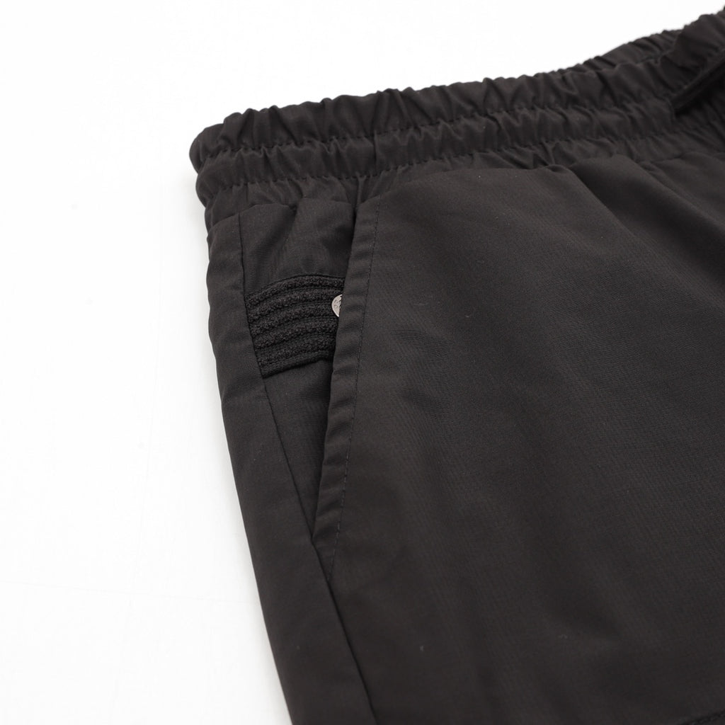Black Prada shorts with gathered elastic waistband and side seam panel
