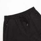 Black Prada shorts with elastic waistband and drawstring tie