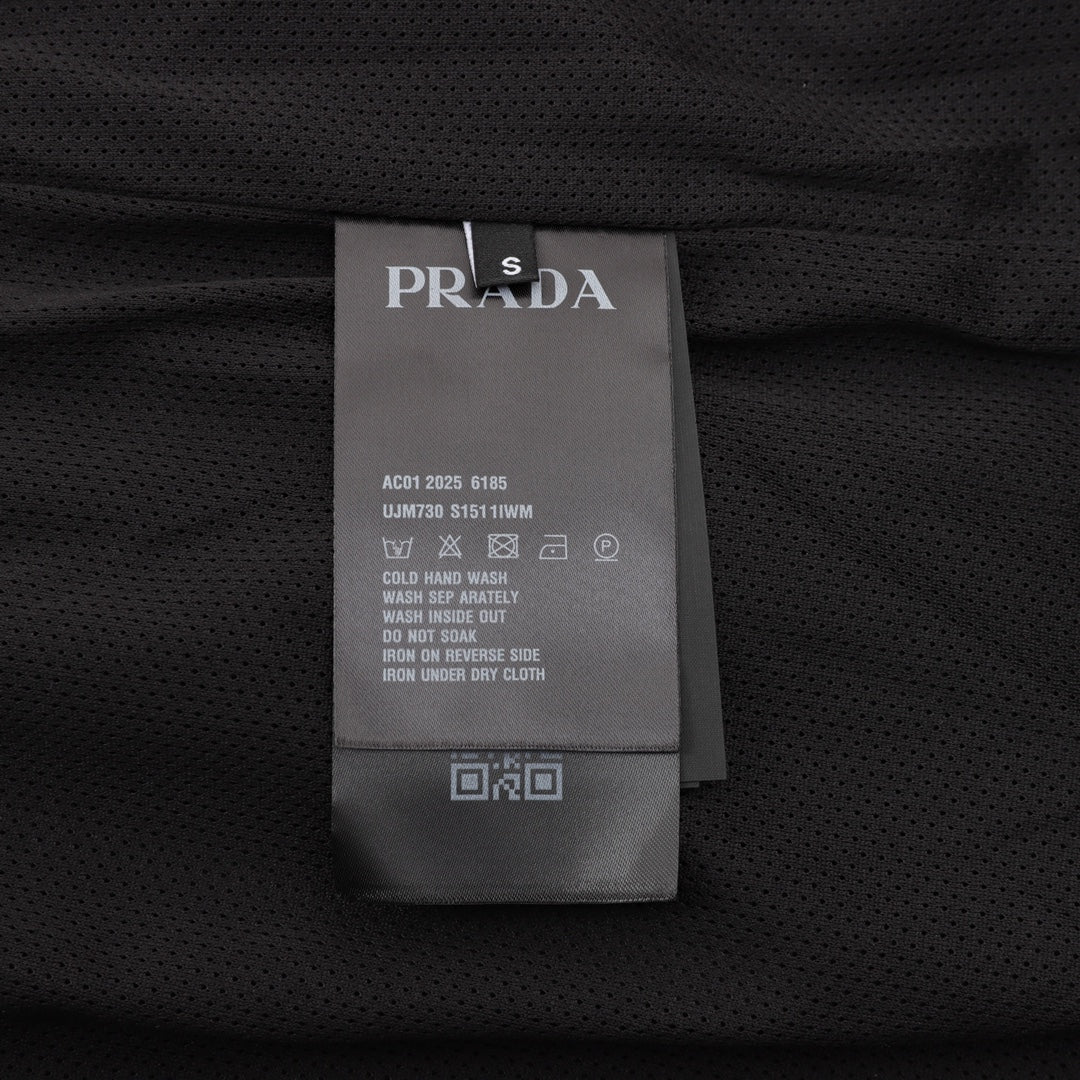Prada care label on black shorts fabric