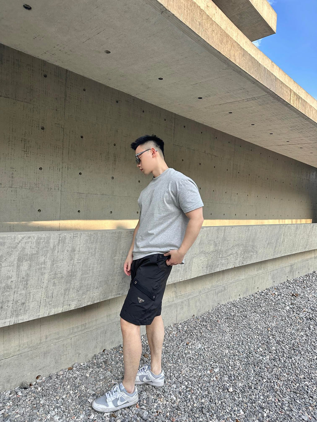 Prada black cargo shorts with drawstring waist and side pockets