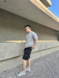 Prada black cargo shorts with drawstring waist and side pockets