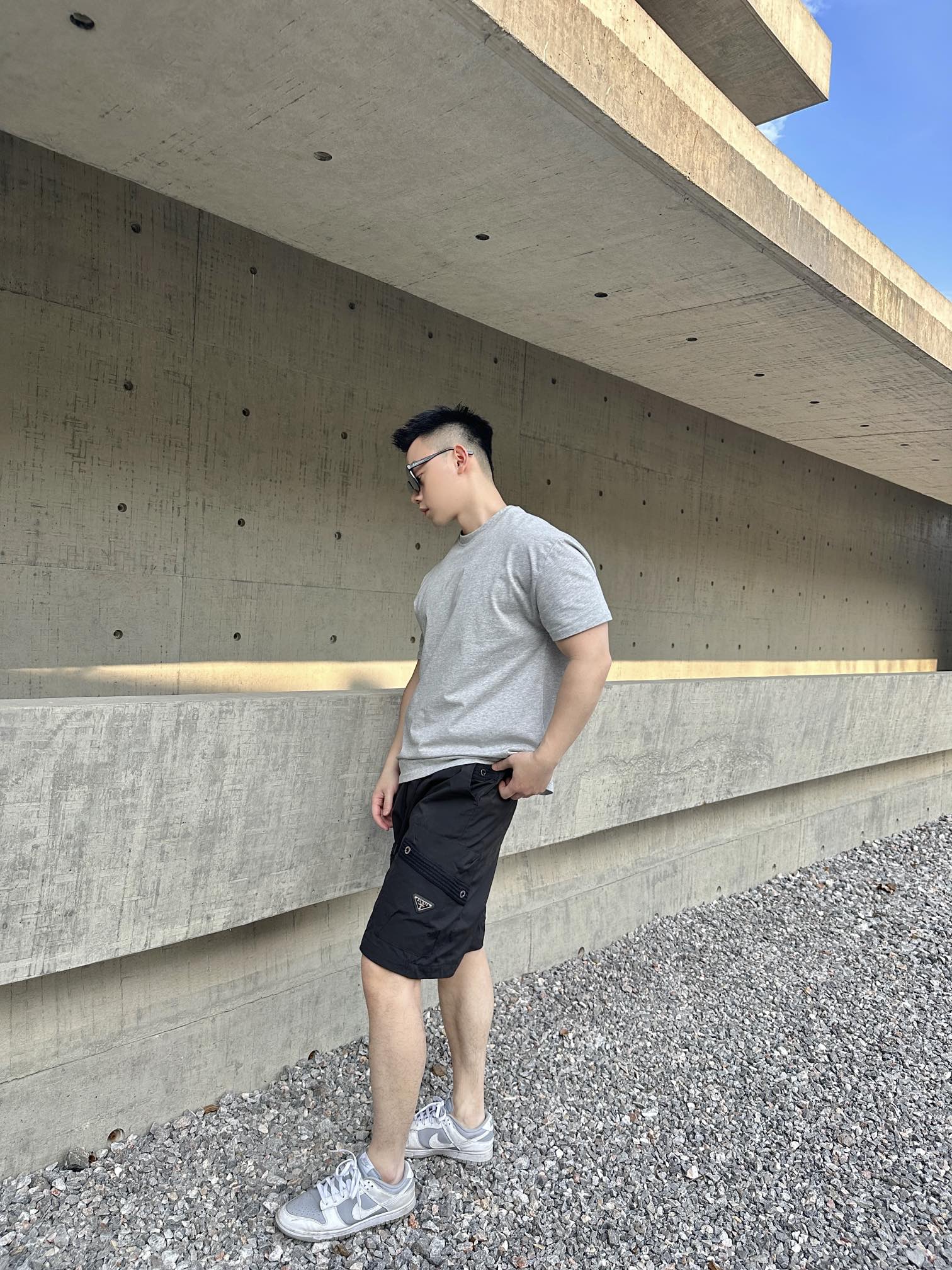 Prada black cargo shorts with drawstring waist and side pockets