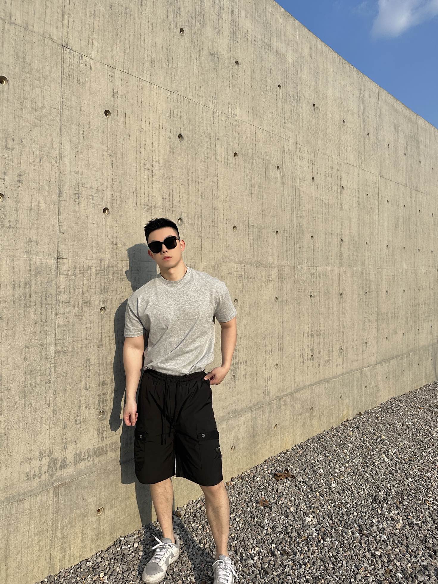 Prada black cargo shorts with drawstring waist and lightweight fabric