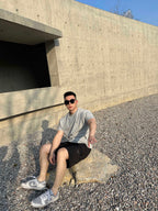 Prada black cargo shorts with relaxed fit and drawstring waist