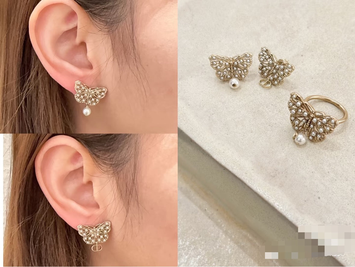 Dior gold-tone butterfly stud earrings with pearl drop