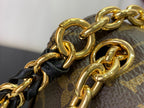 Louis Vuitton monogram bag gold-tone chain links on leather trim