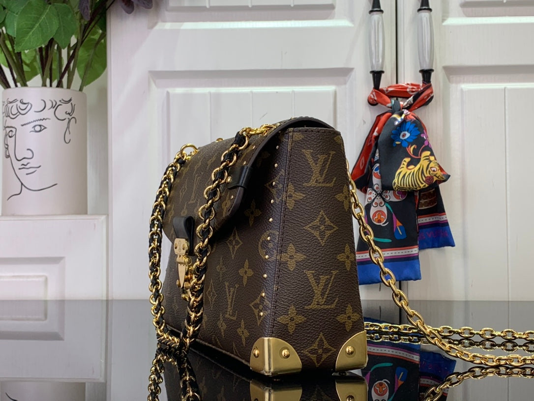 Louis Vuitton monogram bag back view with chain shoulder strap and flap