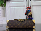 Louis Vuitton monogram bag top view with chain straps and clasp hardware