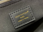 Louis Vuitton monogram bag leather label with 'Made in France' stitching