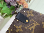 Louis Vuitton monogram bag front flap with leather tab and gold rivets