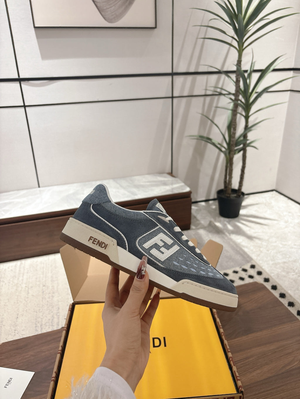 Fendi unisex sneakers in dark blue denim with white laces and side logos.