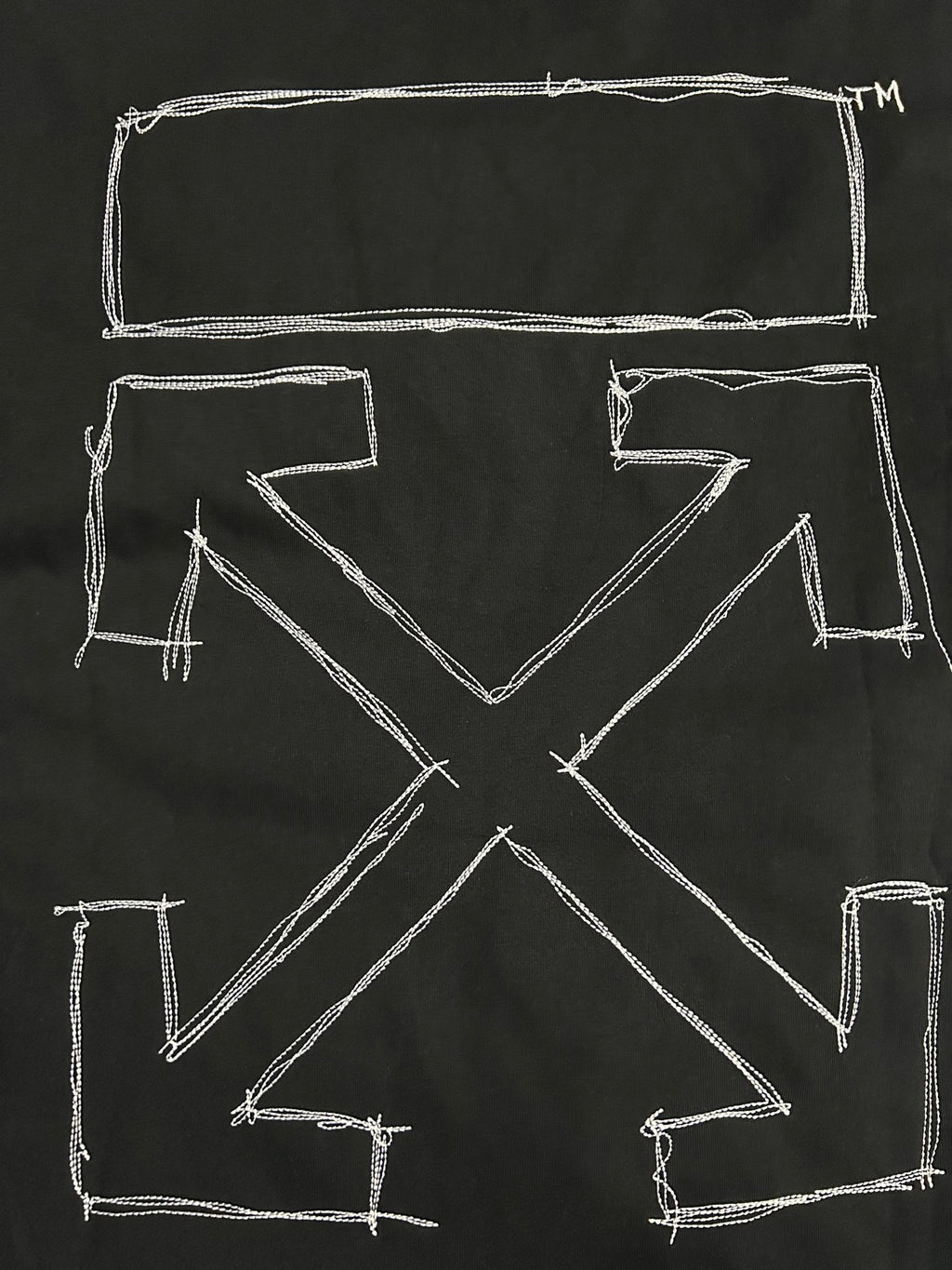 Off-White T-shirt back close-up with large white X and rectangular outlines