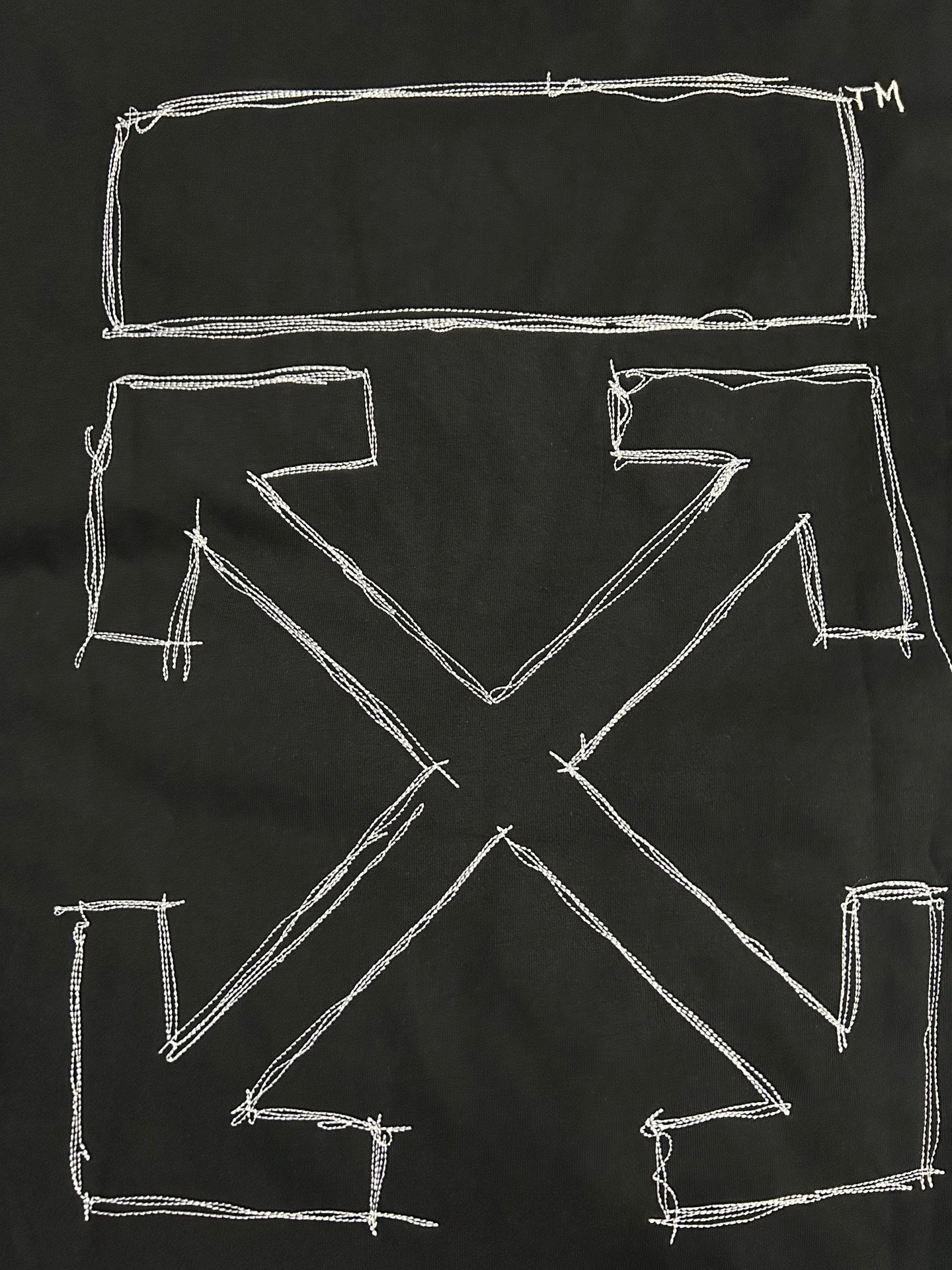 Off-White T-shirt back close-up with large white X and rectangular outlines