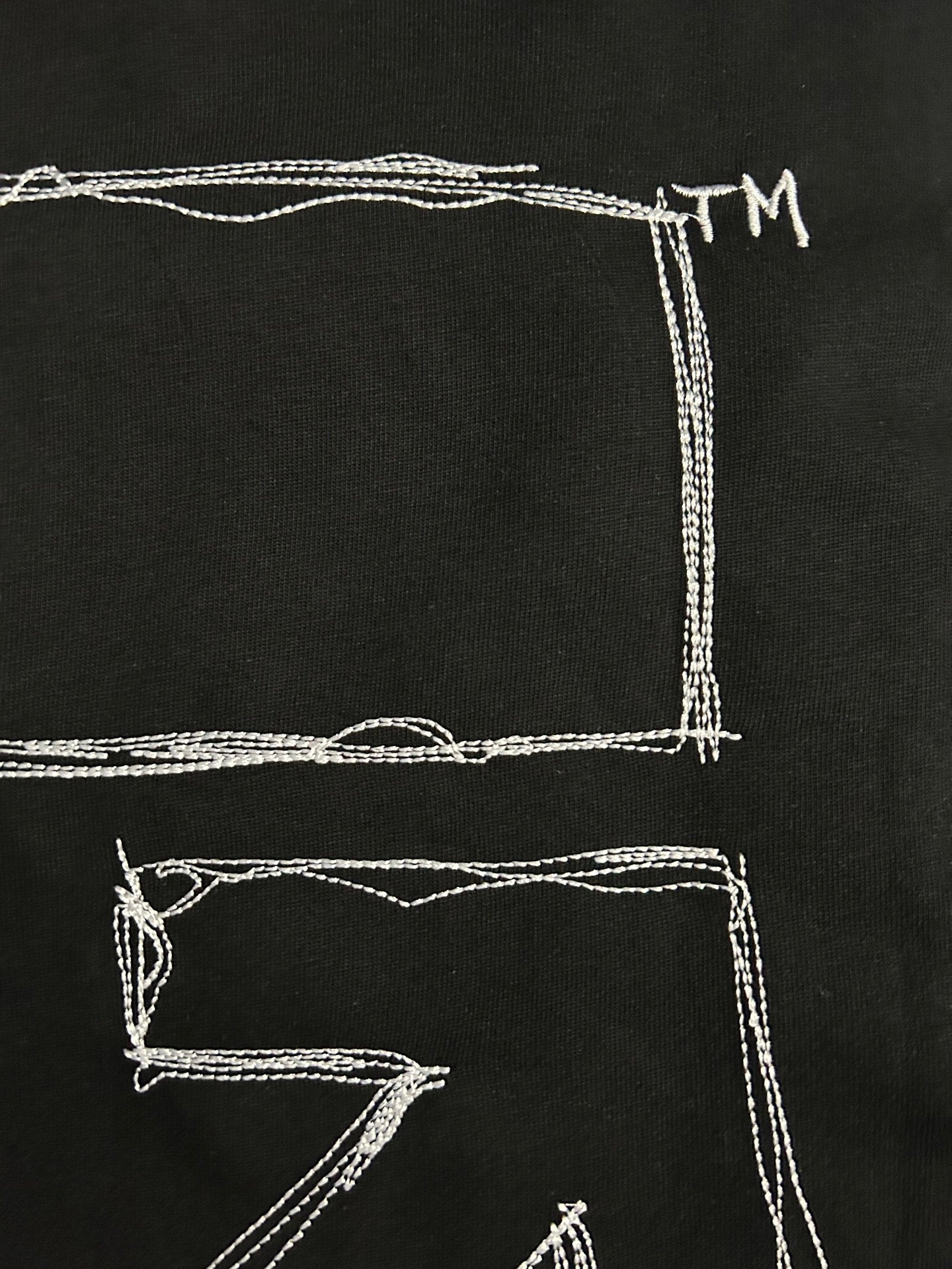 Off-White T-shirt back close-up with white square outline and lines