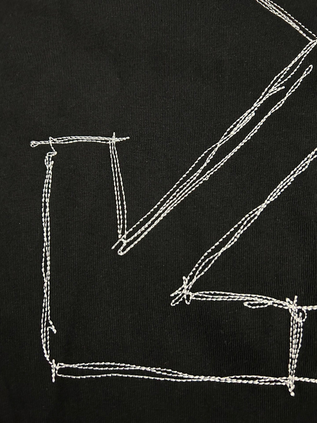 Off-White T-shirt back close-up of white diagonal line-art