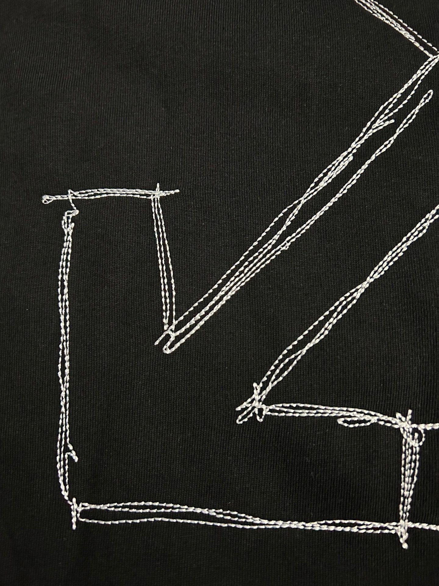 Off-White T-shirt back close-up of white diagonal line-art