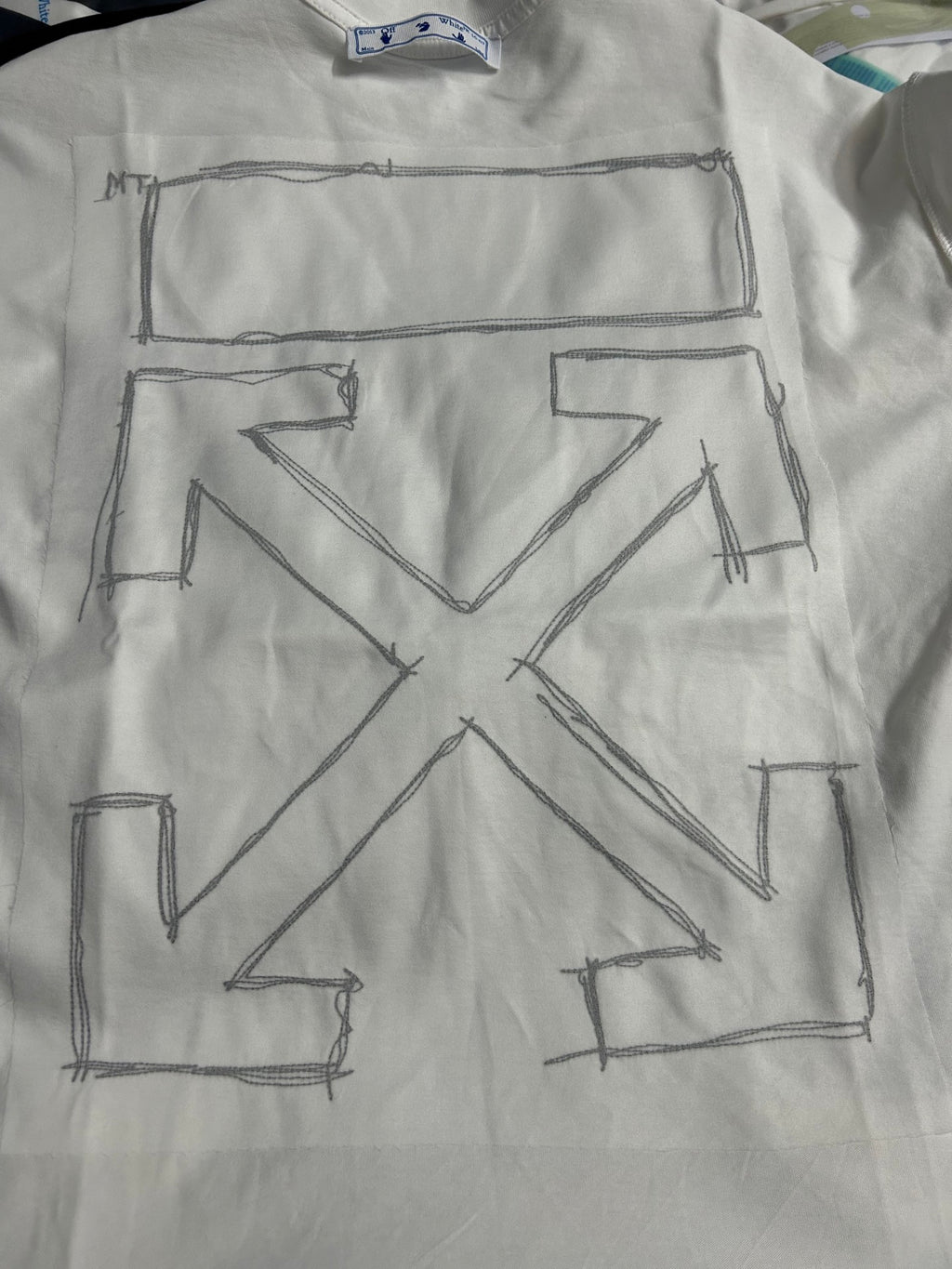 Off-White off-white T-shirt chest close-up of large black X graphic