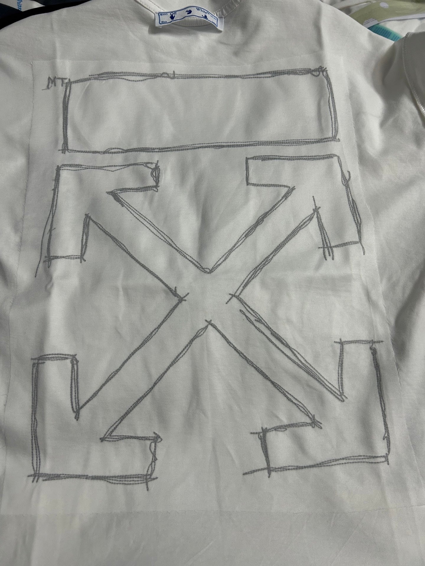 Off-White off-white T-shirt chest close-up of large black X graphic