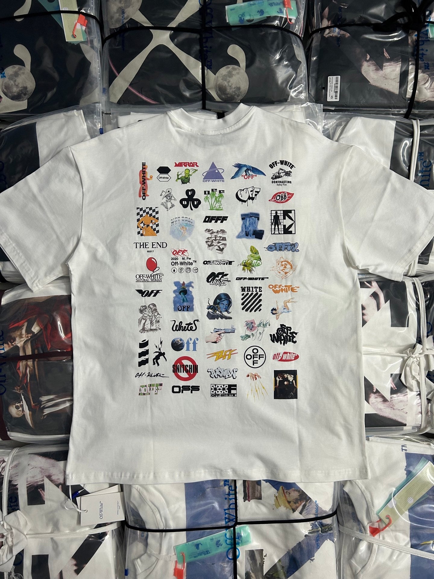 Off-White white T-shirt covered with colorful character and icon prints