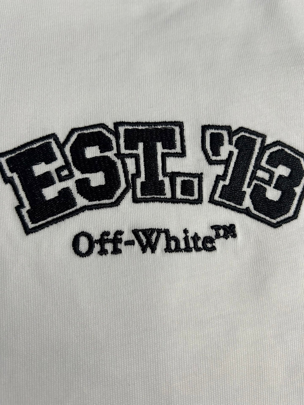 Off-White EST. 1973 and Off-White text logo print