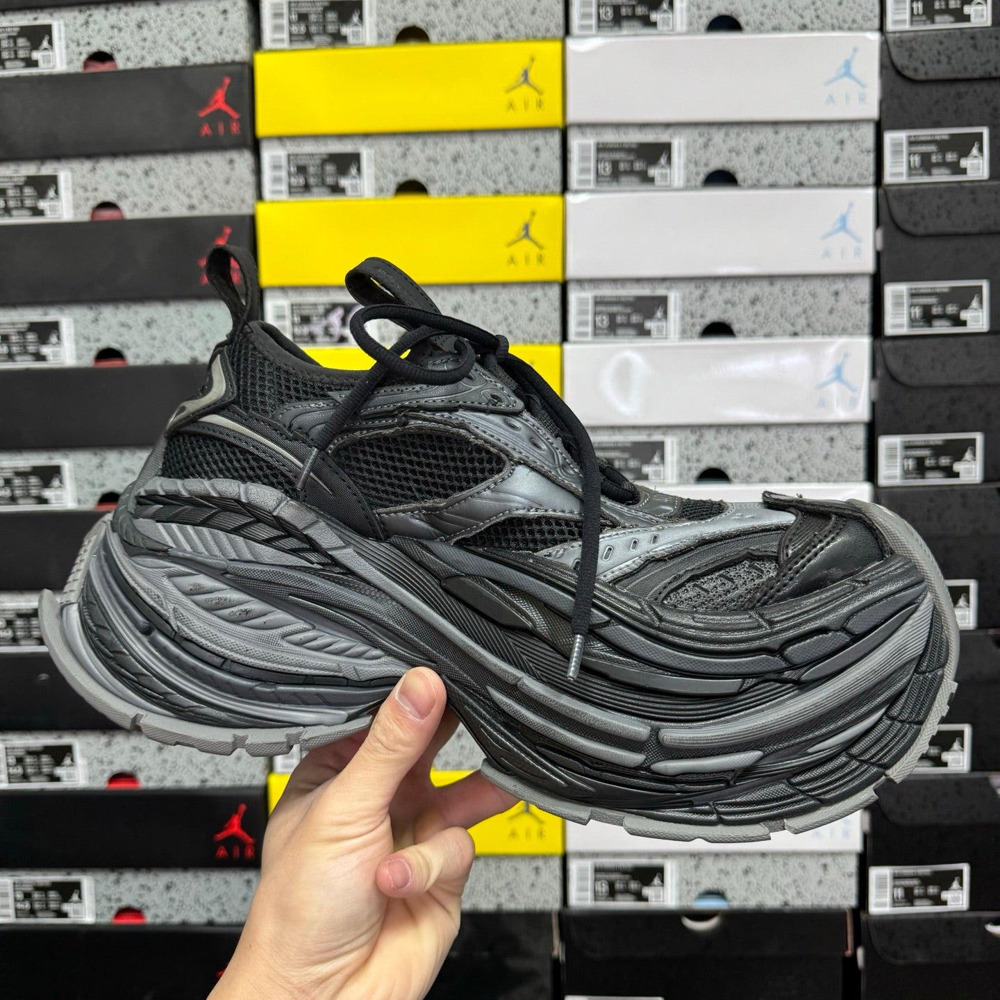 Balenciaga unisex running shoes top view, dark gray mesh and molded side panels