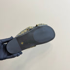Fendi ladies slide sandal outsole view with navy rubber sole and logo