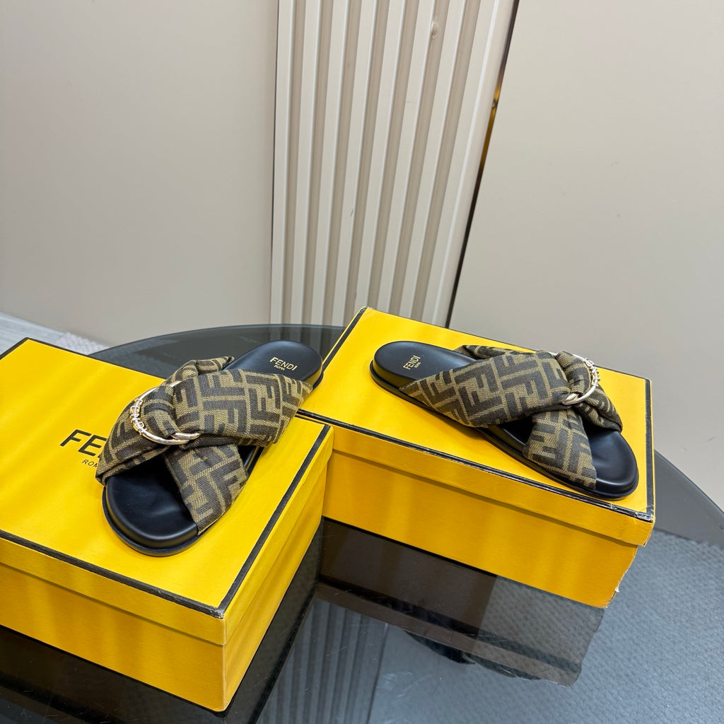 Fendi ladies slide sandals with FF monogram straps and navy textured soles
