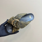 Fendi ladies slide sandal side view with FF jacquard bow strap and gold-tone hardware