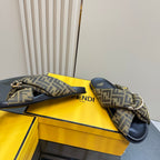 Fendi ladies slide sandal close view with FF jacquard bow strap and gold detail
