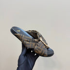 Fendi ladies slide sandal held up, FF monogram fabric strap with metal buckle
