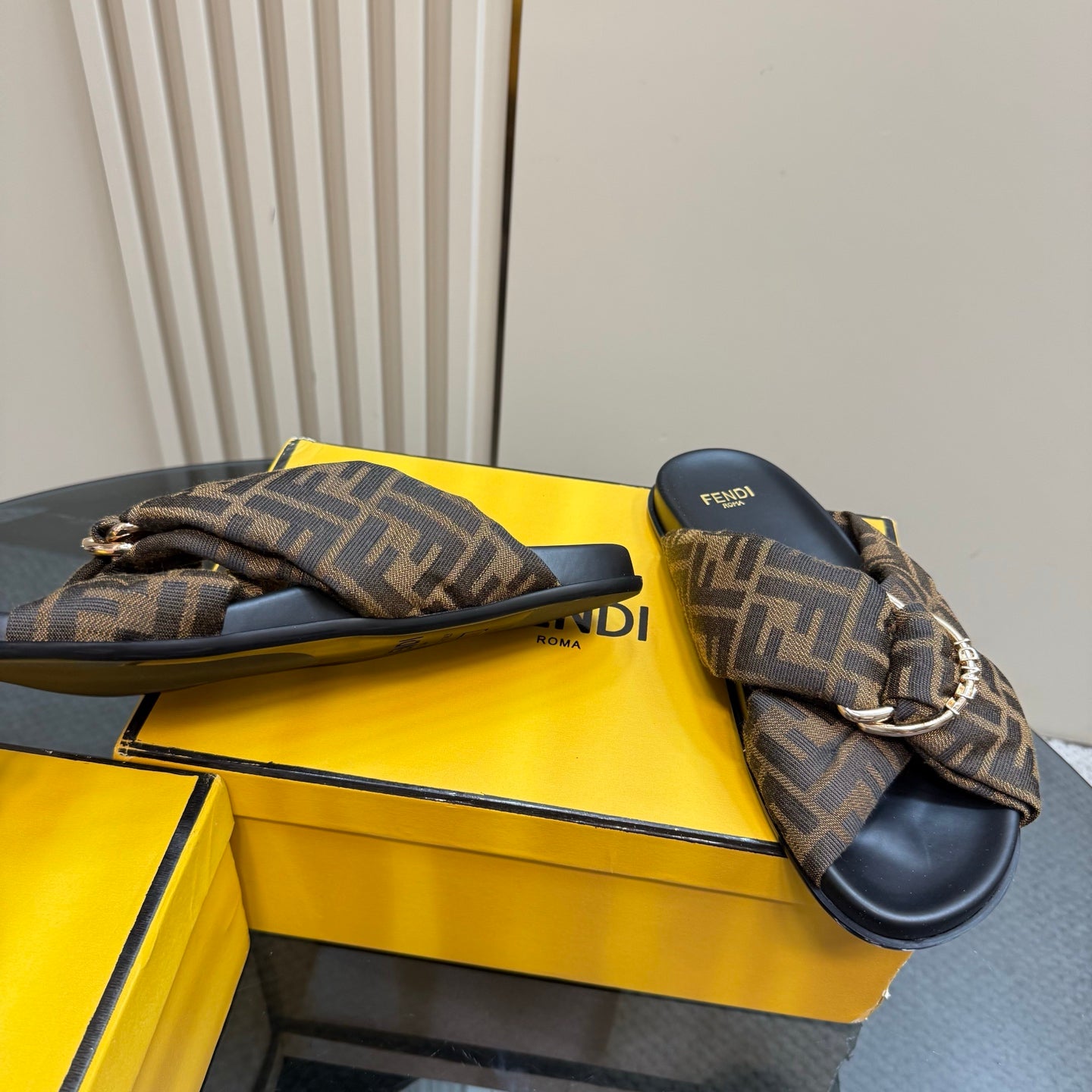 Fendi ladies slide sandals with FF monogram fabric strap and silver-tone buckle