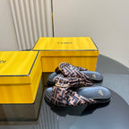 Fendi slide sandals with FF logo patterned strap and dark rubber sole