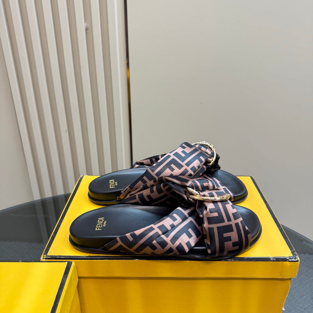 Fendi slide sandals on box, braided FF logo strap with gold-tone hardware