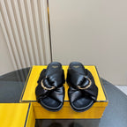 Fendi ladies’ black leather slide sandals, front view with gold-tone chain detail