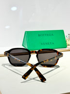 Bottega Veneta glasses with tortoiseshell frame and dark tinted lenses