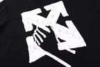 Black T-shirt with large white abstract graphic print on the front